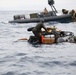 US Marines parachute into Coral Sea
