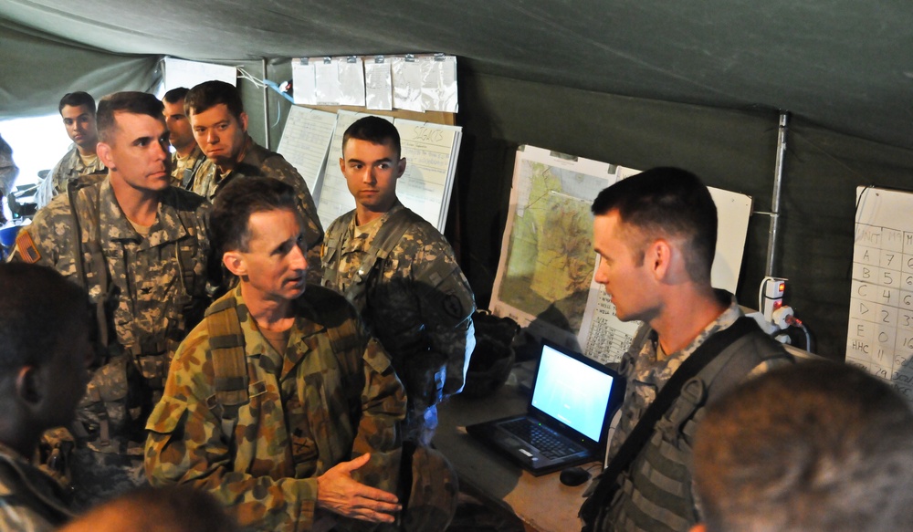 Australian army major general is welcomed by leaders of the 4th IBCT (A)