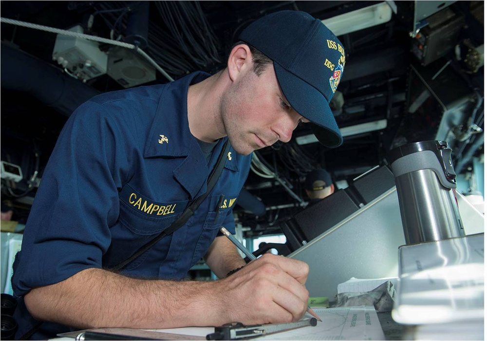 Midshipman practices plotting on maneuvering board