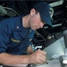 Midshipman practices plotting on maneuvering board