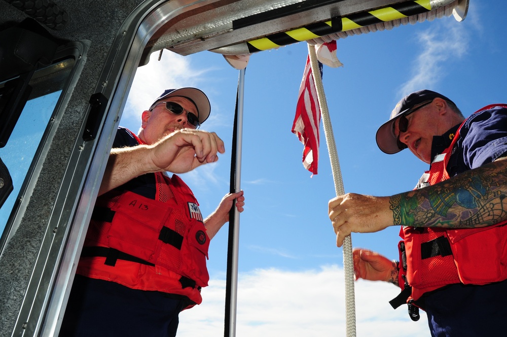 Coast Guard Auxiliary boat crew members