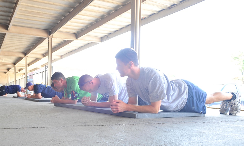 Coast Guard members work out