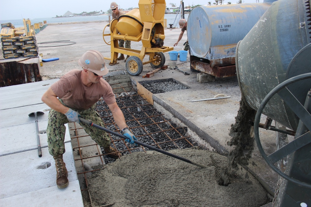 Concrete placement during UCT 2's pier repair in the Kwajalein Atoll