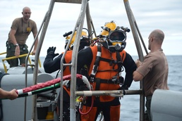 Navy Sailors, Divers Find and Salvage