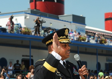 More than 50 recruits are sworn into the US armed forces during Chicago air show
