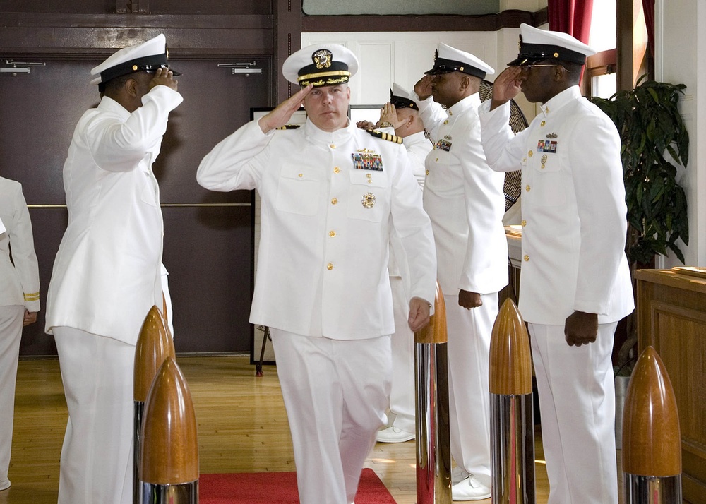 Glenister relieves Owen at change-of-command ceremony