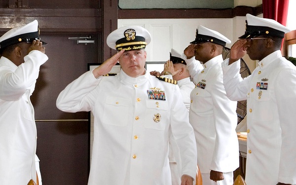 Glenister relieves Owen at change-of-command ceremony