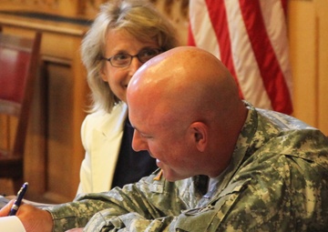 Signing the Connecticut In-Lieu Fee Program agreement