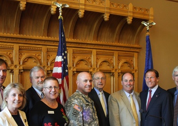 Signing the Connecticut In-Lieu Fee Program agreement