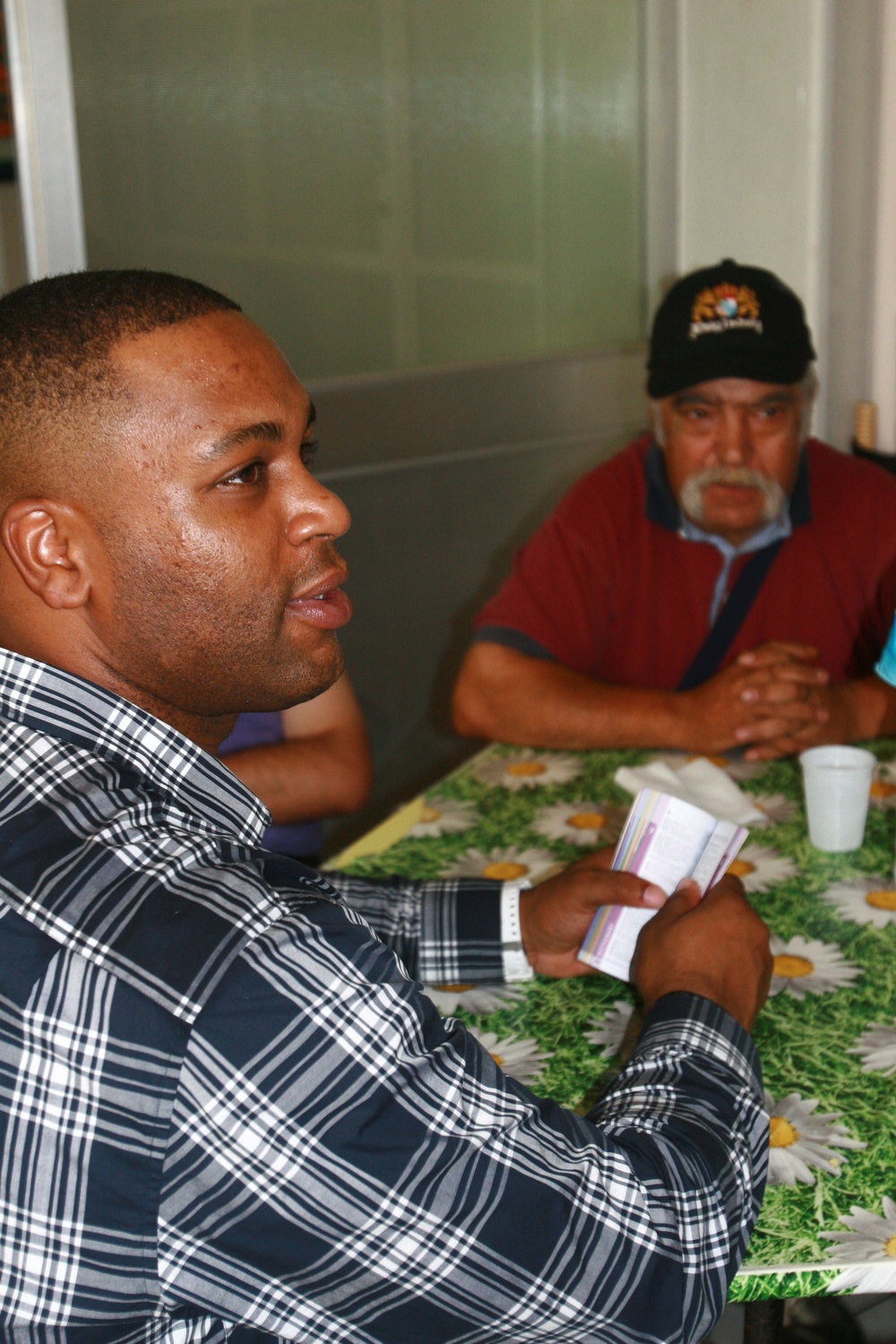 Special-Purpose Marine Air-Ground Task Force Africa 13 pass out food to homeless