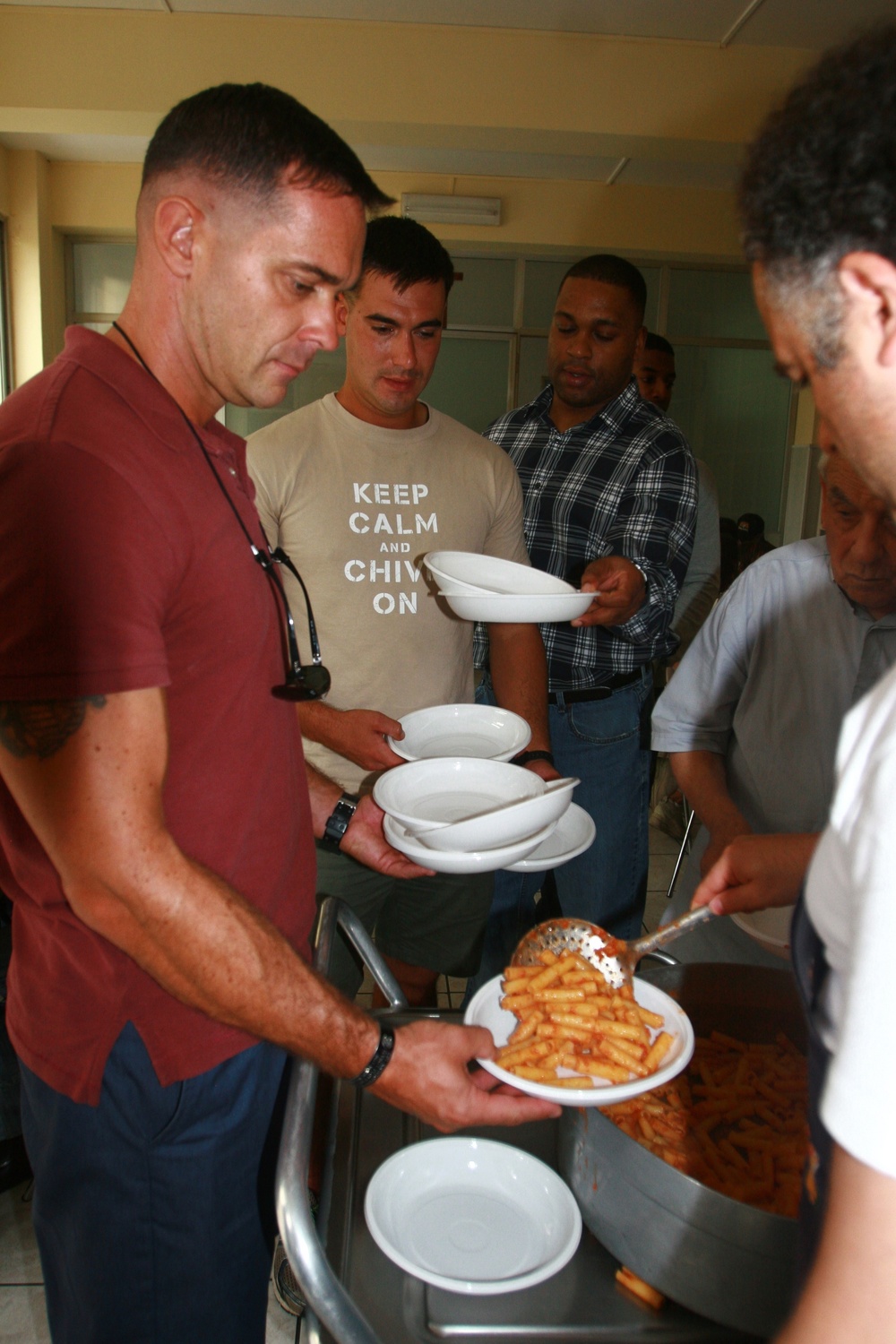 Special-Purpose Marine Air-Ground Task Force Africa 13 pass out food to homeless