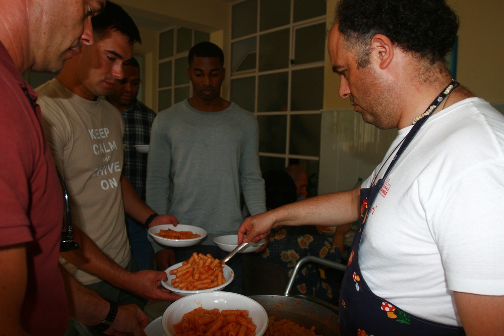 Special-Purpose Marine Air-Ground Task Force Africa 13 pass out food to homeless