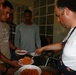 Special-Purpose Marine Air-Ground Task Force Africa 13 pass out food to homeless