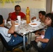 Special-Purpose Marine Air-Ground Task Force Africa 13 pass out food to homeless