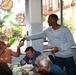 Special-Purpose Marine Air-Ground Task Force Africa 13 pass out food to homeless