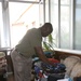 Special-Purpose Marine Air-Ground Task Force Africa 13 pass out food to homeless