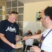 Special-Purpose Marine Air-Ground Task Force Africa 13 pass out food to homeless