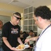 Special-Purpose Marine Air-Ground Task Force Africa 13 pass out food to homeless