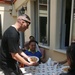 Special-Purpose Marine Air-Ground Task Force Africa 13 pass out food to homeless