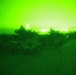 Amphibious assault vehicles perform nighttime assault