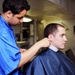 USS George H.W. Bush gets hair cut in barber shop