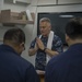 Chaplain leads prayer aboard USS Momsen