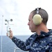 Sailor measures wind and air pressure