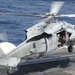 Helicopter takes off from USS Nimitz