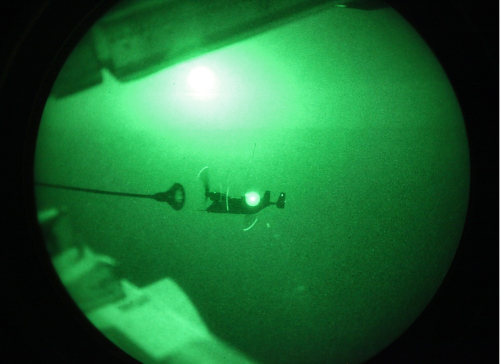 SP-MAGTF Crisis Response aircraft conduct nighttime air-to-air refueling over Spain