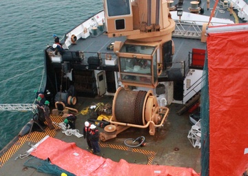 Coast Guard personnel conduct oil spill response training near Homer, Alaska