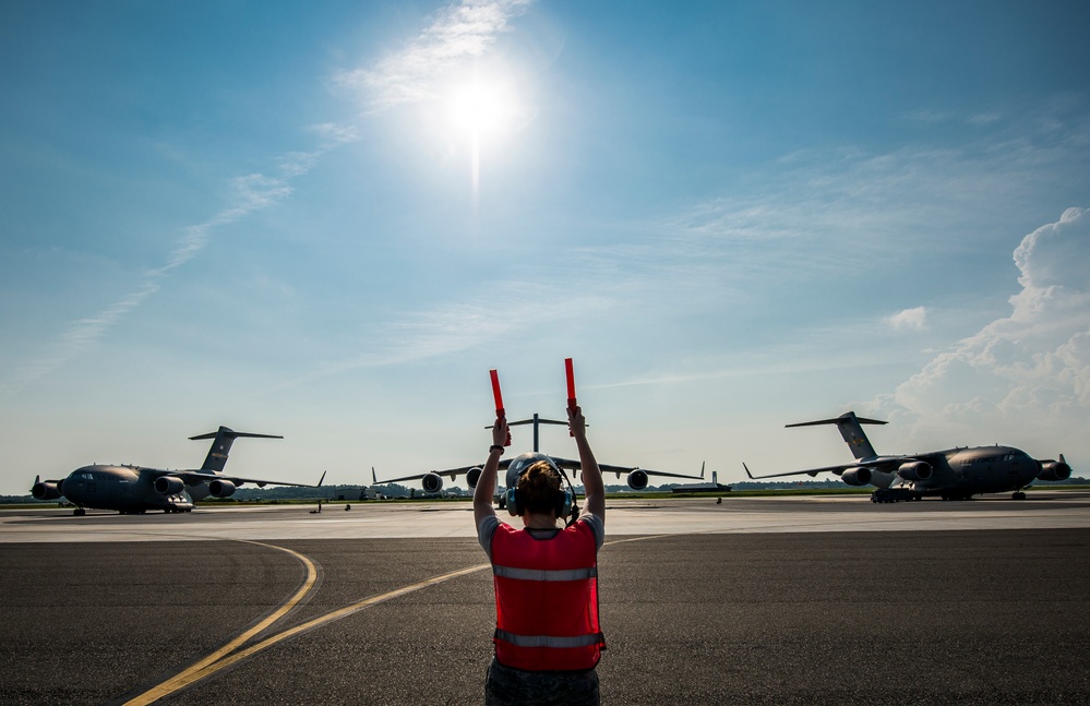437th AW airmen perform C-17 pre-flight checks