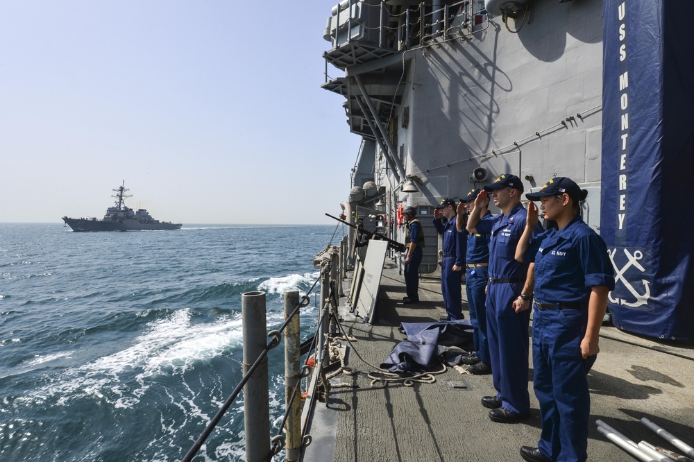 USS Monterey returns passing honors to USS The Sullivans