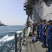 USS Monterey returns passing honors to USS The Sullivans