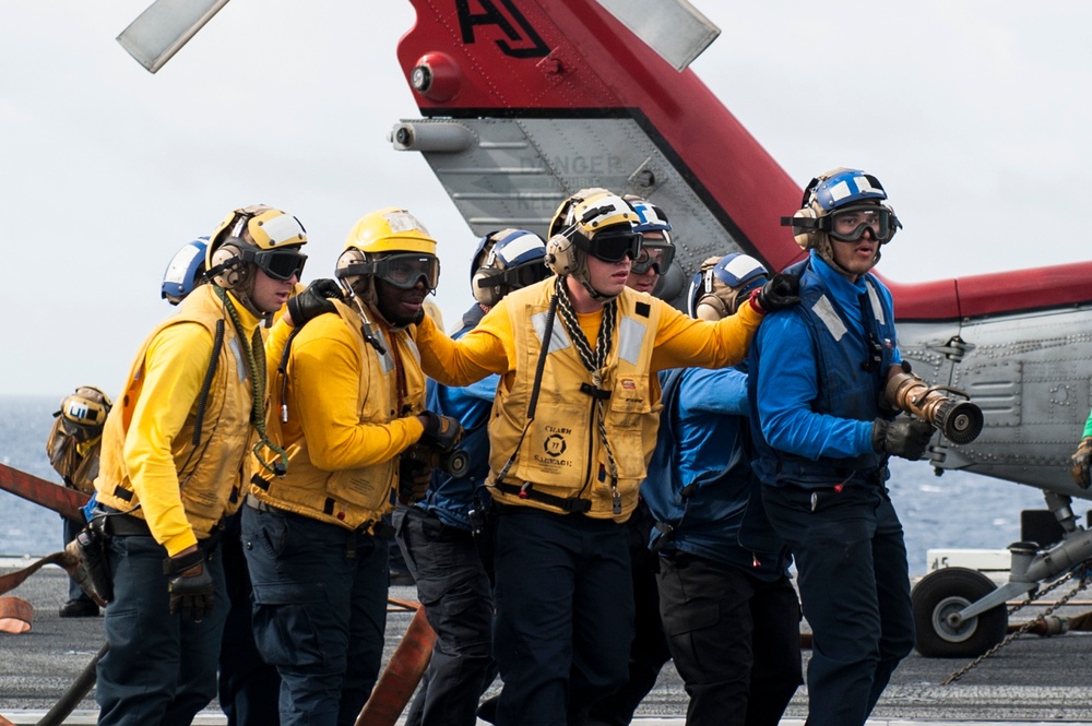 Sailors react to simulated fire