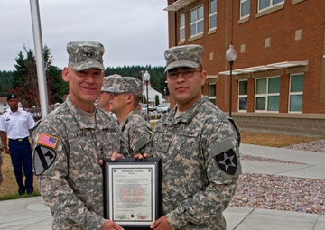 Soldier receives recognition after delivering baby at gate