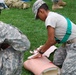 A soldier from Operation Sustainment Warrior practices combat lifesaver skills