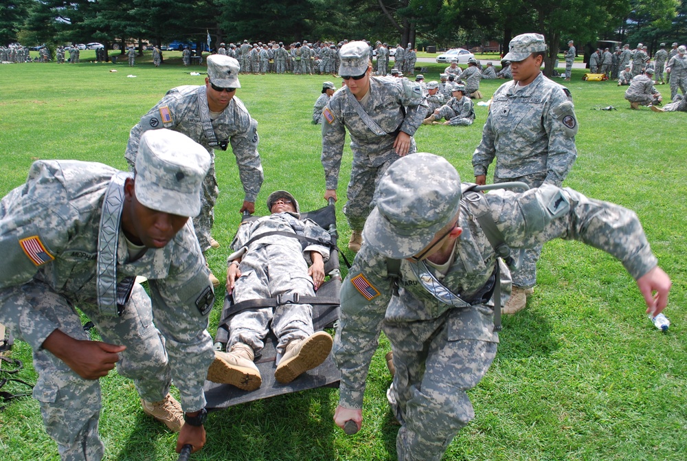 Soldiers carry medical litter at Operation Sustainment Warrior