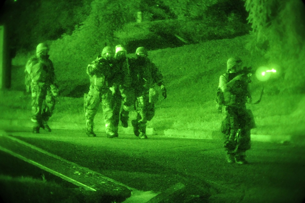 Defenders escort evacuees