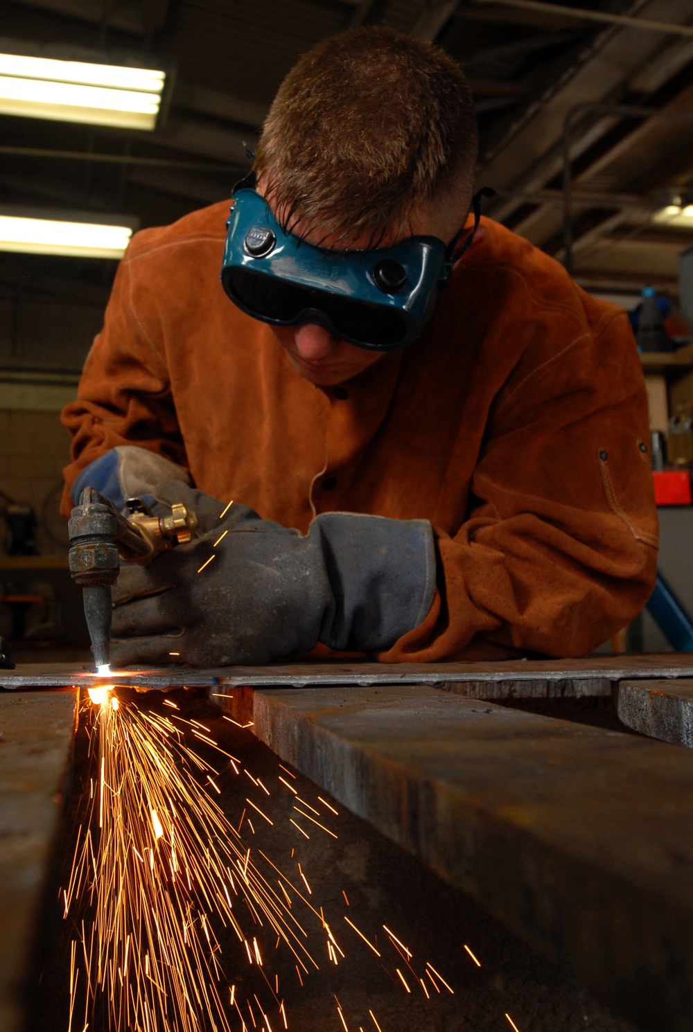 18 Civil Engineer Squadron structure technicians apply metal working skills on Kadena