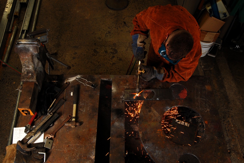 18 Civil Engineer Squadron structure technicians apply metal working skills on Kadena