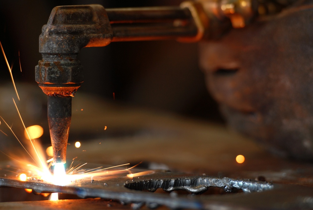 18 Civil Engineer Squadron structure technicians apply metal working skills on Kadena