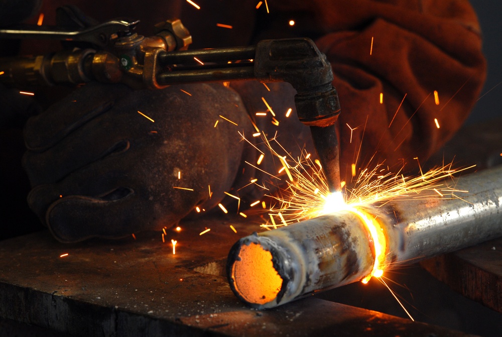 18 Civil Engineer Squadron structure technicians apply metal working skills on Kadena