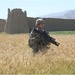 Army engineer searches on open field for IEDs in eastern Afghanistan