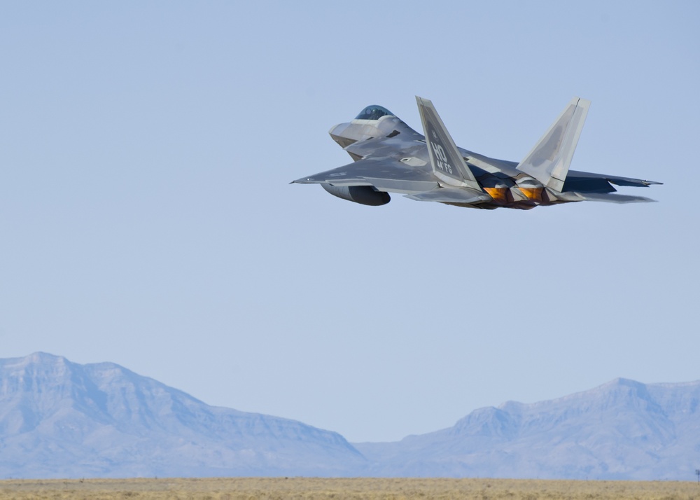 F-22 Raptors take off