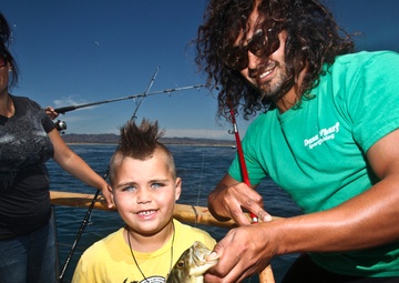 The friendliest catch: Marines volunteer time to take kids fishing