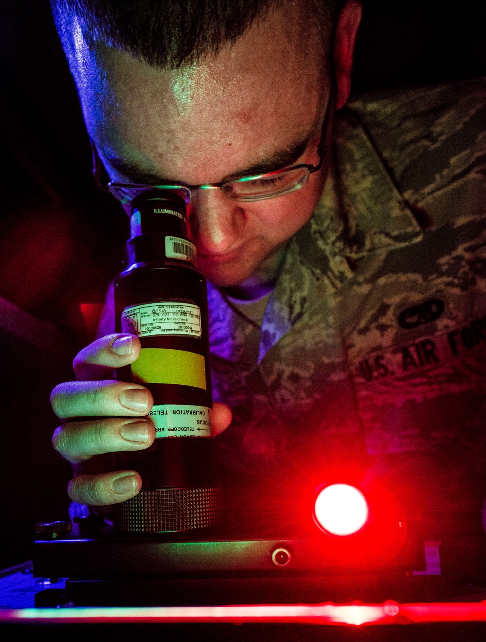PMEL airmen inspect night vision equipment