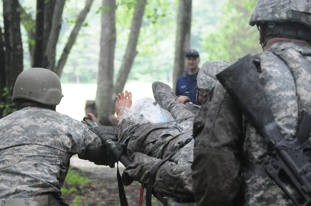 OSW soldiers carry a litter