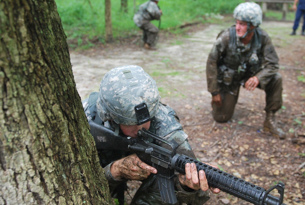 OSW soldier pulls security during litter obstacle course