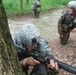 OSW soldier pulls security during litter obstacle course