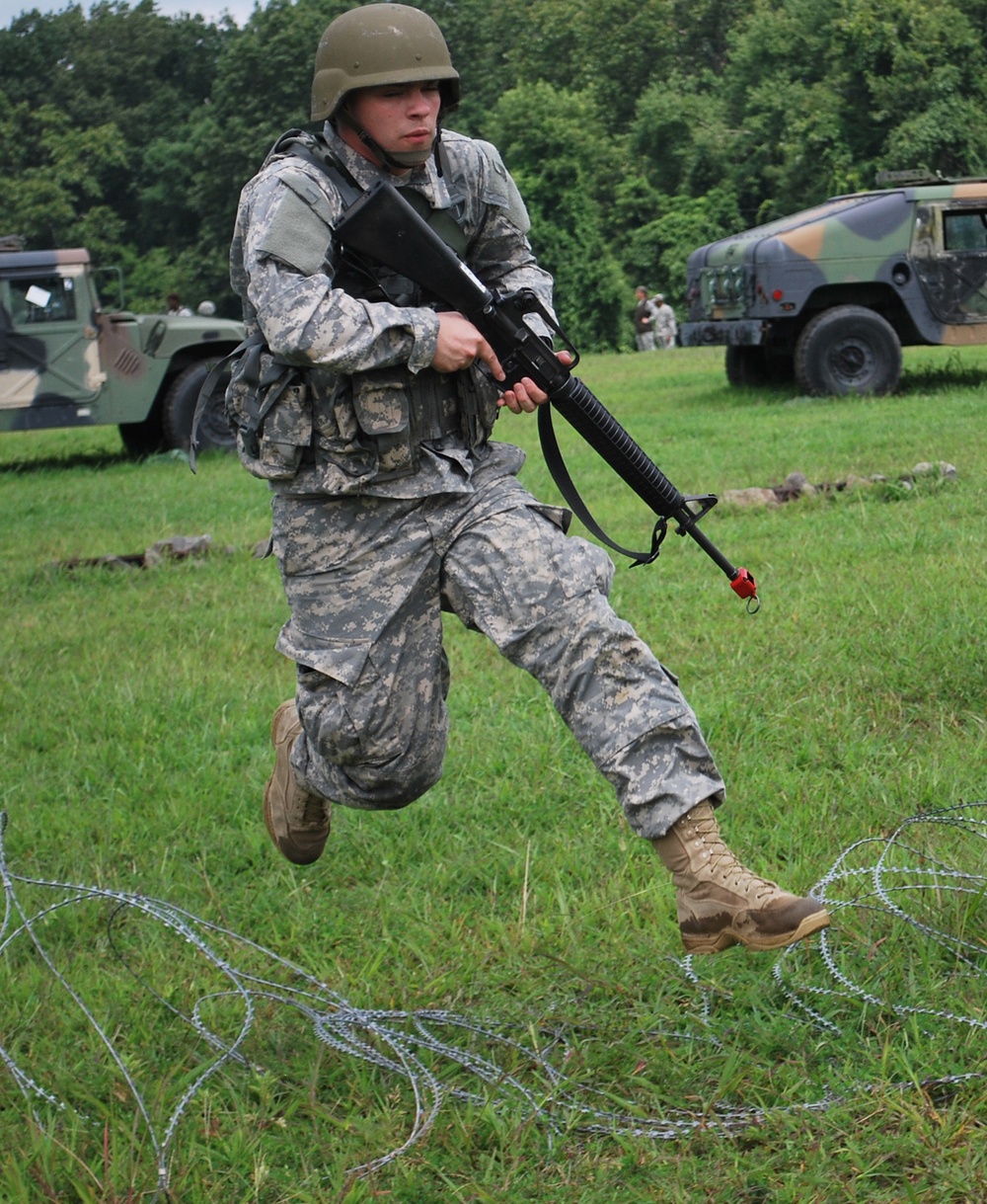 OSW soldier leaps over concertina wire